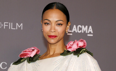 Zoe Saldana had to work "twice as hard" in Hollywood because of her
